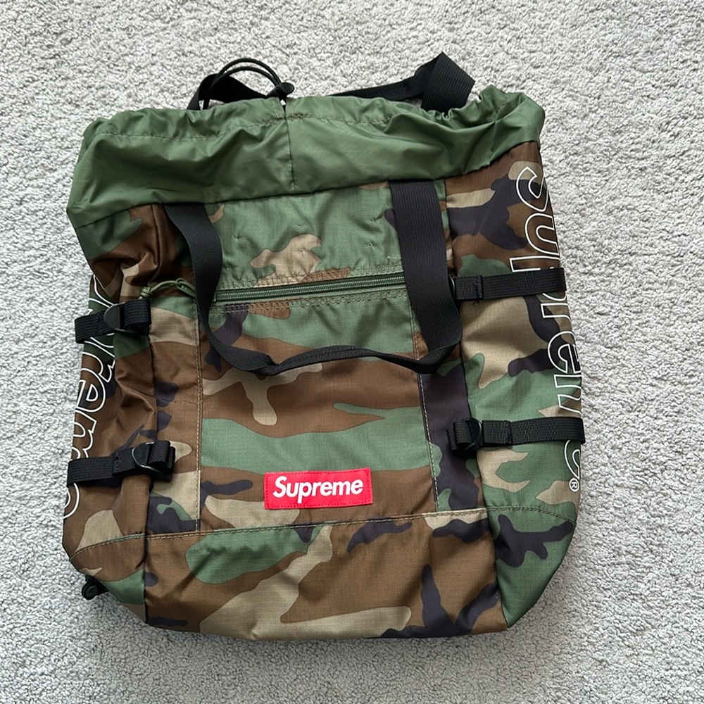 Supreme Camouflage and Green Backpack